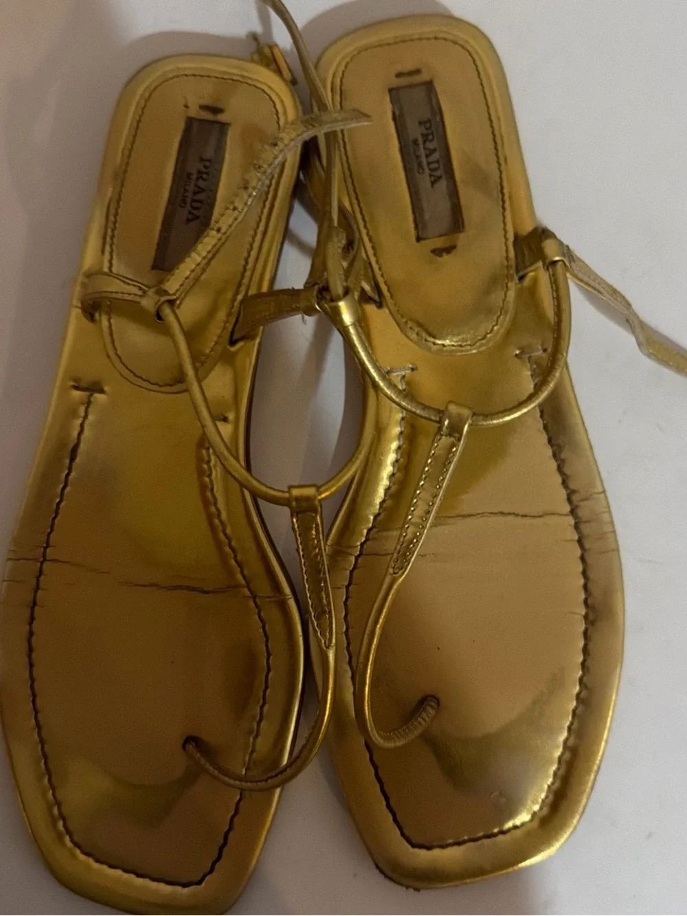 PRADA gold slide on sandals